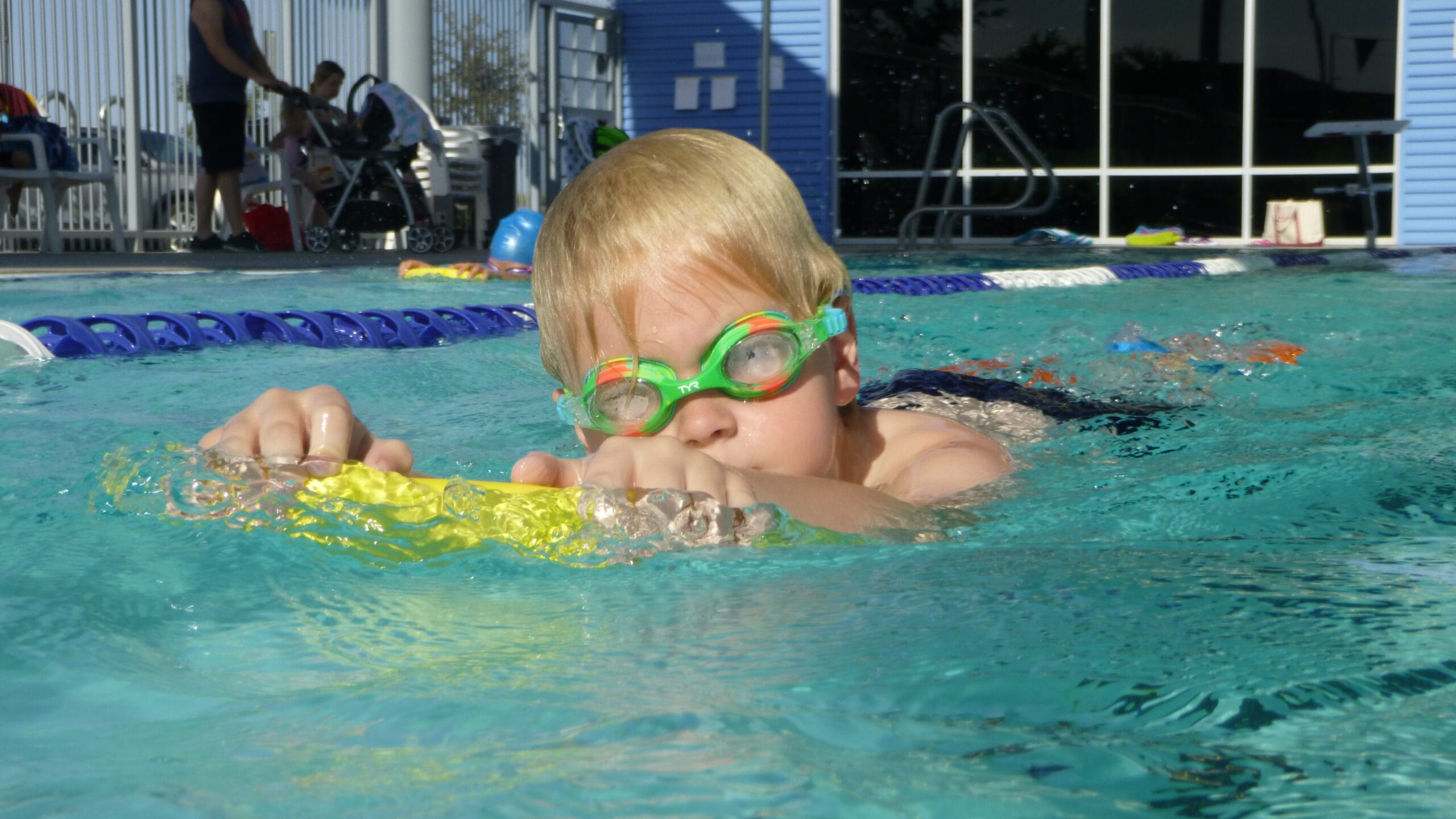 Preschool swimmer learning freestyle